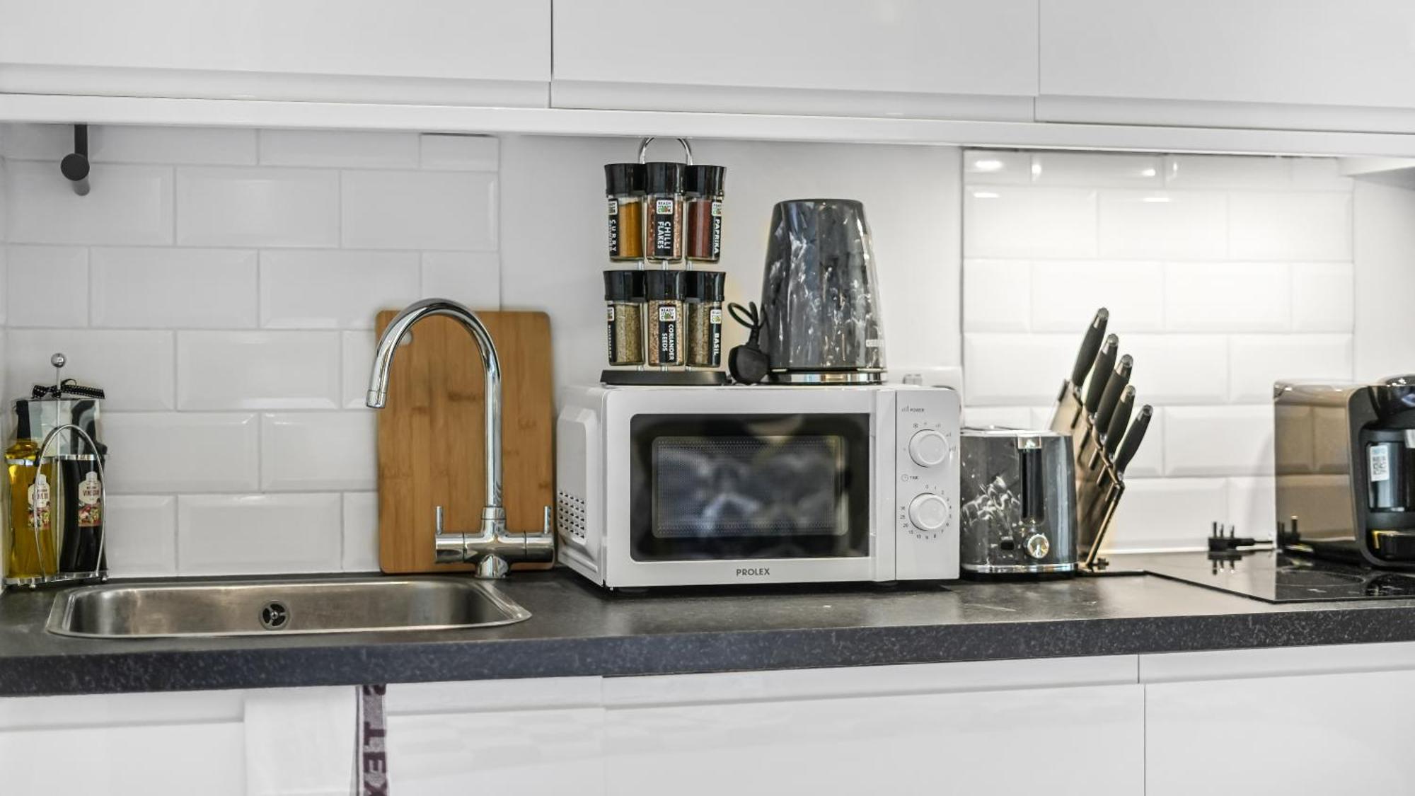 Charming Petite In With Kitchenette